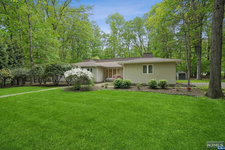 Welcome to your dream home in the heart of Montvale's sought-after Donnybrook neighborhood! This custom-built 4-bedroom, 3-full bath ranch, nestled on a tranquil cul-de-sac, offers the epitome of suburban living with modern luxury and convenience. As you step into this meticulously designed residence, you're greeted by an expansive layout that effortlessly blends comfort and style. The spacious living/dining room is perfect for hosting gatherings or cozy family dinners, while the inviting family room, complete with a fireplace, sets the scene for relaxing evenings. Step outside to your own private oasis, where over 1 acre of park-like property awaits. Other features include gunite saltwater pool, 25 ft sliding doors open from the family room to the screened in porch with Eisen glass curtains to stay warm in the cool months, updated bathrooms, primary bedroom suite with dual closets/sinks, and separate jetted tub. Close to schools and shopping! Schedule your private tour today!