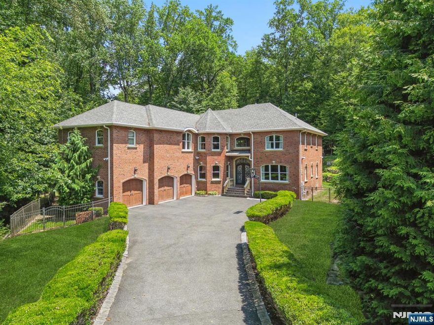 Exquisite Handcrafted Estate Nestled on a Private Cul-de-Sac Welcome to a masterpiece of timeless craftsmanship and modern luxury. This custom-built, opulent home is a rare findâ€”meticulously designed with the finest attention to detail and nestled on a lush, landscaped parcel at the end of a serene cul-de-sac. Step inside and be greeted by soaring ceilings, intricate millwork, and rich textures throughout. The heart of the home is a true gourmet kitchen, outfitted with professional-grade appliances, custom cabinetry, and a spacious islandâ€”perfect for entertaining or crafting culinary delights. The luxurious master suite is a retreat unto itself, featuring a spa-inspired en suite bath and dual Jack & Jill walk-in closets that offer both elegance and function. Every corner of this residence reflects thoughtful design and artisan-quality finishes. Outside, mature trees and lush greenery provide privacy and serenity, creating the ideal backdrop for outdoor living and quiet moments alike. This is more than a homeâ€”it's a lifestyle of refined elegance and peaceful seclusion. Schedule your private tour today and experience this exceptional property firsthand.