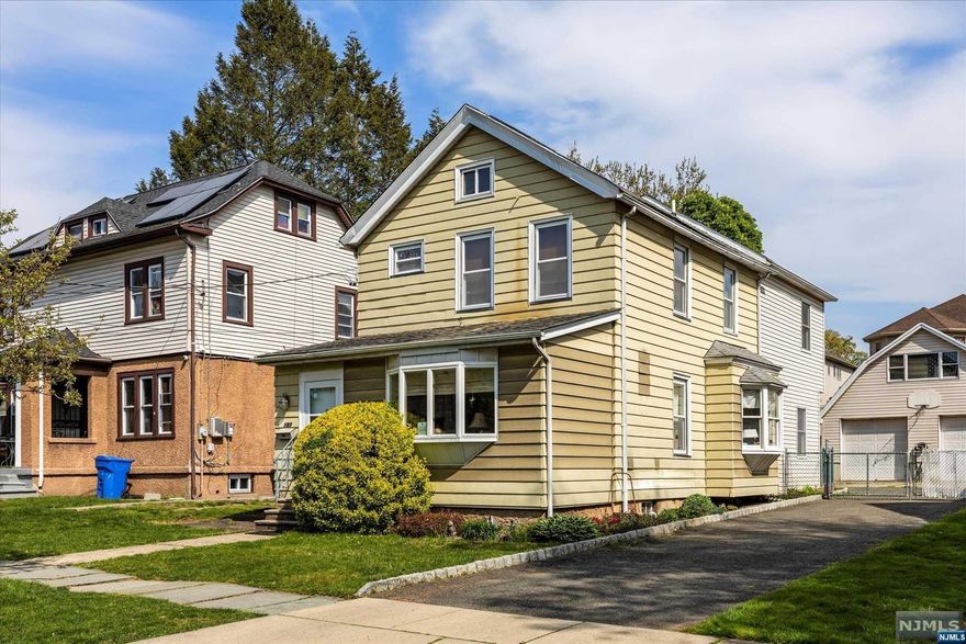 Welcome to this three bedroom, two and half bathroom home nestled in the heart of Rutherford. This home is on an oversized lot and has a large garage with a loft. The first floor features an airy living room with plenty of natural light which leads into a formal dining room. Adjacent is the kitchen which has ample countertop space, cabinet storage and a stove that will inspire culinary creativity. The first floor also has a half bathroom, laundry area and a large family room which leads directly to the backyard patio. The second floor features the primary bedroom with cathedral ceilings, full bathroom and walk in closet. There are additionally two more bedrooms and another full bathroom on the second floor. The home is located very close to NYC transportation and a small downtown area.