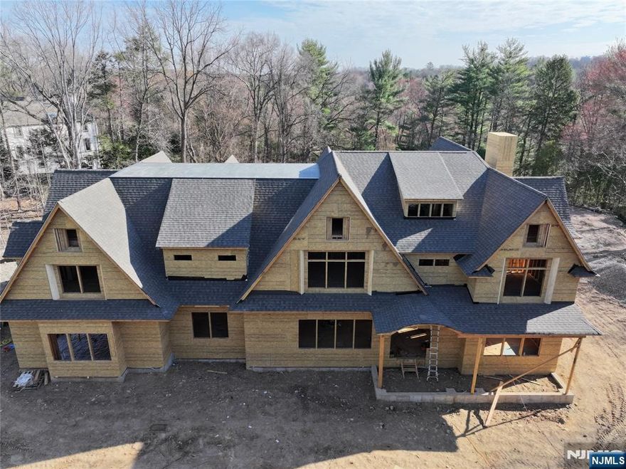 Exquisite New Construction Estate Located on 2+ Private Acres â€“ Surrounded by Upscale Homes, A Rare Hidden Gem! There is Still Time to Customize. Anticipated Completion Spring 2026.