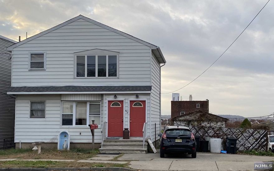Great investment property ,good area and close to everything.House needs TLC and is heated by Oil. Nice size apartments with 3bed 1 bath in each,finished walkout basement with one bedroom and full bath..Diamond in the ruff ! Will not last!