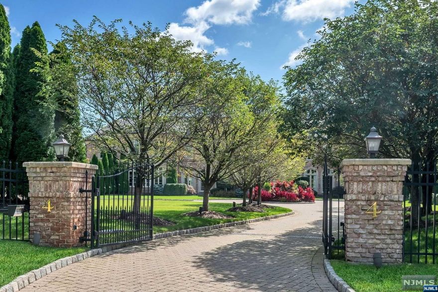 THE QUINTESSENTIAL ALPINE ESTATE IS THE ESSENCE OF LUXURY LIVING. ONE OF THE FINEST BUILT AND WELL-DESIGNED HOMES IN NORTHERN BERGEN COUNTY. THIS HOME IS MAJESTICALLY SET ON 4 GATED MANICURED ACRES IN RIO VISTA, ALPINE. DESIGNED BY JAMES PARAGONO AND BUILT TO AN EXTREMELY HIGH STANDARD, THIS IMPECCABLY MAINTAINED MANOR SHOWCASES 12' CEILINGS WITH ARCHITECTURAL ELEMENTS THROUHGOUT, 22,782 SQUARE FEET OF LUXURIOUS LIVING SPACE ON THE 4 LEVELS PLUS A POOL, CABANA, TENNIS COURT, GUEST HOUSE AND A PUTTING GREEN. THIS HOME FEATURES GARAGE PARKING FOR 8 CARS, ELEVATOR TO ALL 4 FLOORS, 25 ROOMS, NEW SALERNO KITCHEN, 8 BEDROOMS, 9 FULL AND 3 HALF BATHS, BOWLING ALLIEYS, HOME THEATER, COMMERCIAL GENERATOR, NEW HIGH EFFICIENCY FURNACES, BRICK EXTERIOR AND SLATE ROOF. A COMPLETE RESORT JUST 6 MILES FROM NEW YORK CITY, SEE THE VIRTUAL TOUR FOR MORE DETAILED INFORMATION.