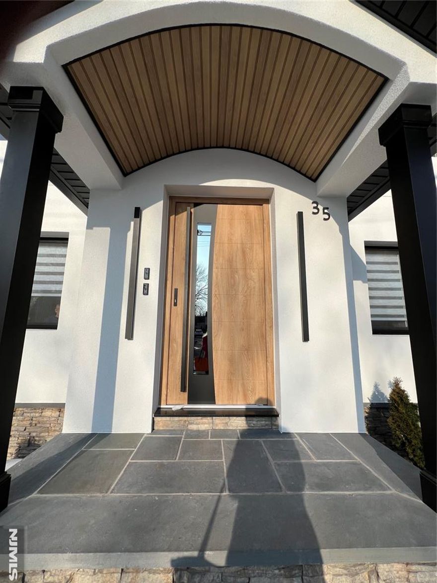 Available MARCH 1st, 2nd floor beautiful apartment in a two family house. Stairs. Spacious rooms with larger kitchen and living room with extra closet. Recently totally renovated, new kitchen with granite countertop, new floors, updated bathroom. Brand new SS appliances (refrigerator, dishwasher) Central air and plenty of light coming through new windows. Commuter's dream location, few blocks to NY buses. One assigned parking. No pets allowed. Laundry in a closet (combo W/D). Landlord requires min GOOD credit score (experian), satisfied income and interview.