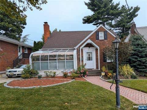 Photo of 217 Riverdale Drive, Fort Lee, NJ 07024 (MLS # 26027426)