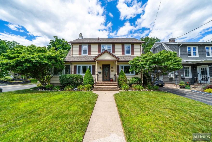 Welcome to 124 Mill Street, a lovely colonial home that is full of charm and just steps away from Westwood's downtown! The first floor is bright and spacious, with a living room that includes a fireplace and a beautiful sunroom addition, a large dining room, kitchen with a skylight, and powder room. The second floor has 3 bedrooms, which includes a large master bedroom, and 1 full bathroom. The staircase on the second floor leads to a finished attic, which is perfect as a fourth bedroom or home office space. This fantastic home has all new windows, including in the sunroom, and a new roof. The fenced-in yard has a large deck that is perfect for entertaining and a one-car detached garage. Walking distance from both bus and train to NYC, great schools, and local shops and restaurants!