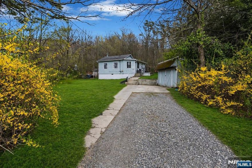 Charming and inviting, this 1-bedroom, 1-bath ranch-style home offers the perfect blend of comfort and simplicity. Designed for easy one-level living, the home features a bright and airy layout with a cozy living area and a well-appointed kitchen that flows seamlessly into the dining space. Step outside to enjoy a beautifully set-up outdoor area, complete with a spacious deckâ€”ideal for relaxing or entertaining. Whether you're enjoying morning coffee or hosting guests, the private backyard provides a peaceful retreat and backs directly to state land, offering added privacy and a serene natural setting. From the front porch, take in lovely lake viewsâ€”perfect for unwinding at the start or end of your day. Perfect for first-time buyers, downsizers, or anyone seeking low-maintenance living, this home delivers both convenience and charm in a truly special setting.