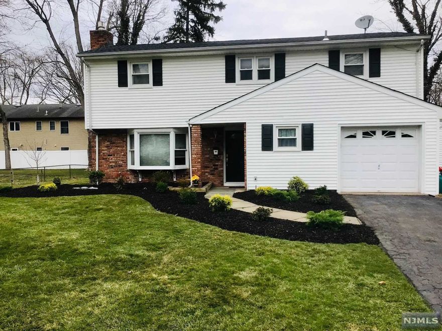 Gorgeous move in ready fully updated split level, open floor plan home in one of the best school districts in NJ. Hurry, it won't last long! Large newly remodeled eat in kitchen with premium appliances, new roof, remodeled bonus room with closet and separate entrance could be used as a 4th bedroom or private office. Gas fireplace. Central air conditioning, fully insulated, updated electrical service. This house has been decorated with top of the line Ethan Allen Furniture and decor...all furnishings are negotiable.