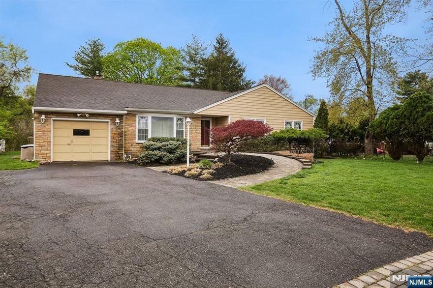 Welcome to your new home! In the desireable town of Pompton Lakes this 3BR/4Full Ba is waiting for its new owner. Located near schools,restaurants,shopping, and public transportation on a quiet side street. Enjoy single level living at its finest. Enter into an expansive entrance hall w/ a beautiful sunken LR to your left w/hrdwd floors and gas fireplace. Take a small step up and see your DR connected on both sides by a large kitchen w/center island, and large family room w/doors leading to your backyard. Windows are everywhere to let in the natural light. Off of the kitchen is the basement entrance as well as your laundry and another door leading to the backyard. Take a right after you enter and the hall leads to 3 roomy BR's. The first 2 BR's are on your right along with your first full bath with a HUGE shower. Keep going down the hall to your massive Primary BR complete with renovated Full BA featuring double sinks, soaking tub and shower. Primary has a double closet for all your clothes and shoes! Between the Primary and the laundry is a 3rd Full BA. Make your way downstairs to the partially finished basement complete w/rec,room,bonus room,w/closet and full Ba. Use as guest quarters or extra living space. The substantial backyard has a deck w/tv, firepit table and chairs as well as 2 sheds. Hardwood floors have been refinished and rooms have been painted. This is truly a great home, make your appointment before its gone!