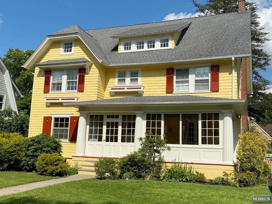 Located on one of Montclair's most sought-after streets, a unique 1915 craftsman colonial offers 7BR/3.5 baths. Awash in natural light. Classic and elegant finishes w/built-ins. DR w/cove ceiling. First floor layout provides circular flow for easy entertaining. French doors connect LR to enclosed front porch for larger gatherings. EIK w/large pantry. Mudroom. Back porch overlooking fenced yard. Offers plenty of living and office space. Primary BR w/connecting 7th bedroom has en suite bath featuring double sinks, a BainUltra Airbath and separate glass shower. Addt'l full baths on 2nd and 3rd floors. 2 zone C/A/C, two-car garage. Large basement w/possibilities and separate Laundry Rm. Easy walk to NYC transportation, parks, shops and restaurants completes your living experience in this beautiful home.
