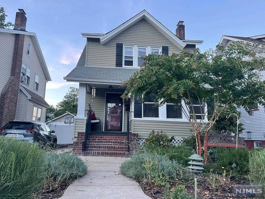 Long driveway leading to detached garage. Second floor bedrooms have been primed and is waiting for your color palette choices. New furnace replaced this year and newer water heater. Walk up attic and basement have the potential to be finished for additional living space. Large backyard with potential for adding a pool or fire pit patio. Property being sold AS IS.