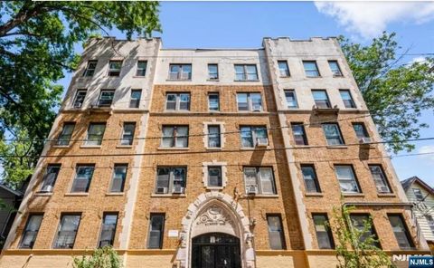 Photo of 17 Elwood Pl #305, Newark, NJ 07104 (MLS # 26012408)