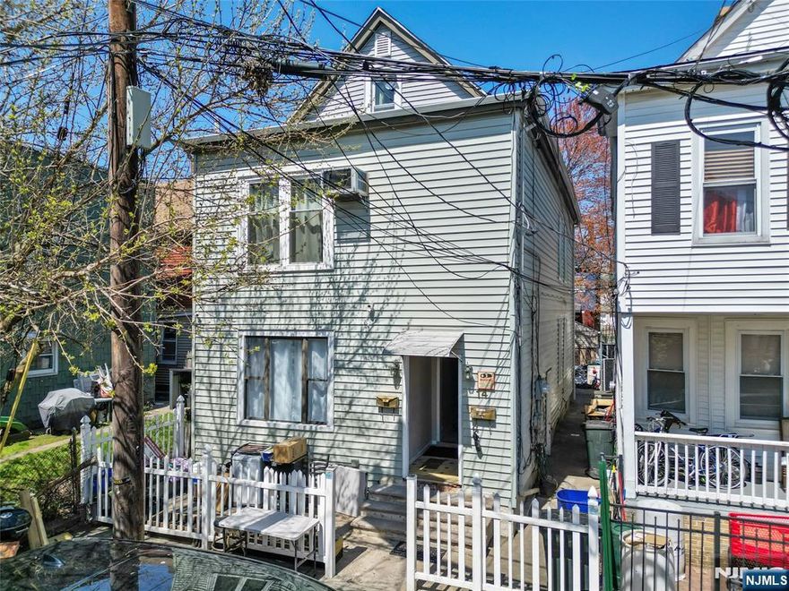 Excellent investment opportunity in Clifton! This two-family home offers ample living space for tenants. Municipal parking lot just blocks away! Unit 1 features two bedrooms, 1 bath. Unit 2 is a duplex-style unit offering 2 bedrooms on the 2nd floor plus an additional 2 rooms in the finished attic. This home also offers a partially finished basement. Separate utilities for each unit. This property is ideal for those looking to capitalize on rental income in a high-demand area. Enjoy the bonus of lower taxes!