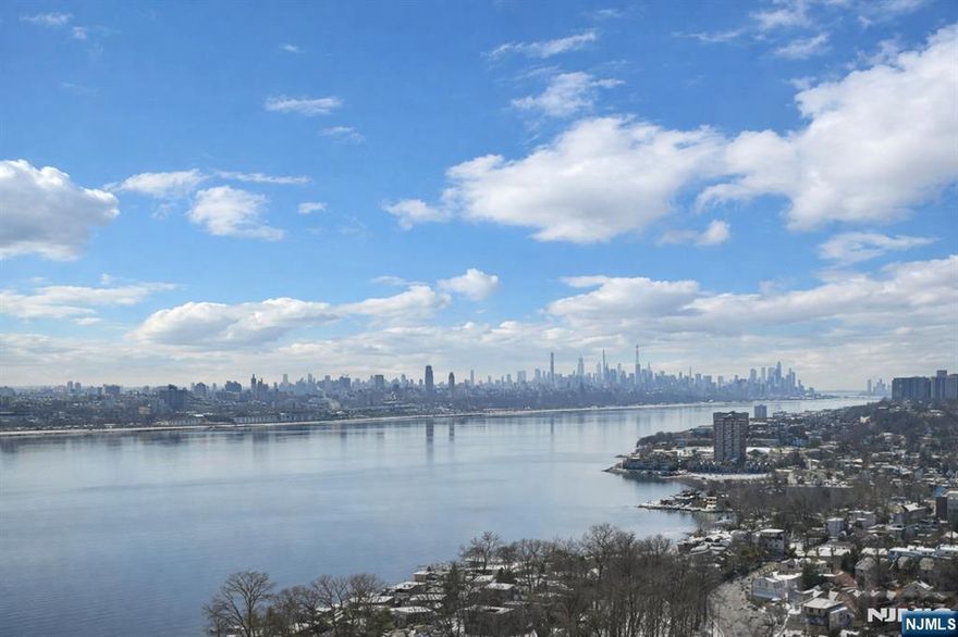 Most desirable â€˜08â€™ line at The Palisades offering breathtaking southern views of the NYC skyline and Hudson River from every window. This sun-drenched 2BR/2.5BA residence features brand-new flooring, stainless steel appliances, in-unit washer/dryer, and abundant closet space throughout. Enjoy seamless indoor-outdoor living with a private veranda showcasing panoramic NYC views. Rent includes two indoor garage parking spaces and a private storage room. Residents enjoy full-service luxury amenities including a state-of-the-art fitness center, outdoor pool, community room, childrenâ€™s playroom, BBQ and patio area, and valet services. Ideally located near NYC transportation, fine dining, and Hudson Lights Town Center. Available March 15 (flexible). No pets. No smoking. $500 move-in fee. Must see!!