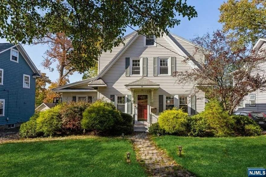 Amazing Location in a highly coveted town of Glen Rock! Pristine Colonial within walking distance to train and downtown. This wonderful house, well maintained and updated, features hardwood floors throughout, 1st floor - living room with fireplace, private home office with nearby powder room and mud area. Entertain in style in a formal dining room or on a double tiered deck, just off the kitchen. 2nd floor - features bright 3 bedrooms and an updated full bathroom. Downstairs the semi-finished basement offers a recreation room, storage area and dedicated laundry room. Fully fenced-in backyard with nice views and a hot tub for your enjoyment. Welcome Home!