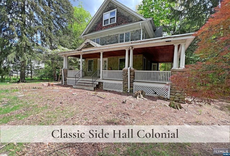 The possibilities are endless in either restoring and expanding this Classic Side Hall Colonial to it's original grandeur or build your own custom home on this gorgeous flat lot spanning nearly a half acre on quiet treelined street in inviting neighborhood. These 130 X 157 lot dimensions just do not become available often in desirable Village of Ridgewood. Opportunity is knocking. Home will require a full renovation.and is sold 'as is'. Some home features include Wraparount Front Porch, Cedar Shake Siding, Triple Columns on Fieldstone Posts, lovely Entrance Foyer w Turned Staircase, large 3rd Floor, and Hardwood Flooring in most rooms. Bring your contractor to set your Dream Home Plans in motion.