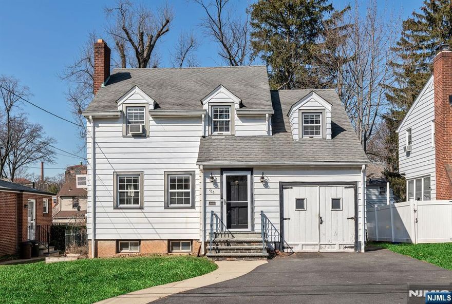 Sunny Sidehall Colonial with 4 bedrooms, 3 full bathrooms, and plenty of character in the highly desirable Country Club area of Teaneck. Approx. 2,100 sq ft plus a finished basement and an attached one-car garage w/ direct entry. The spacious, bright, and flexible main floor features a bedroom (which can also serve as a family room) and a full bath. The open granite kitchen features ample counters & cabinetry as well as access to the deck & fenced-in yard. Upstairs you'll find a king sized primary ensuite boasting a fully outfitted walk-in closet and a bathroom featuring a private toilet & large walk-in shower w/ both handheld & overhead rain fixtures. Two more generous spare bedrooms and a full bath in the hall complete the 2nd floor. Prime location on a quiet block near NYC transit, houses of worship, schools, and parks. Listed by, Romy Ouziel (917-922-9348 / Romy@WeinAgency.com).