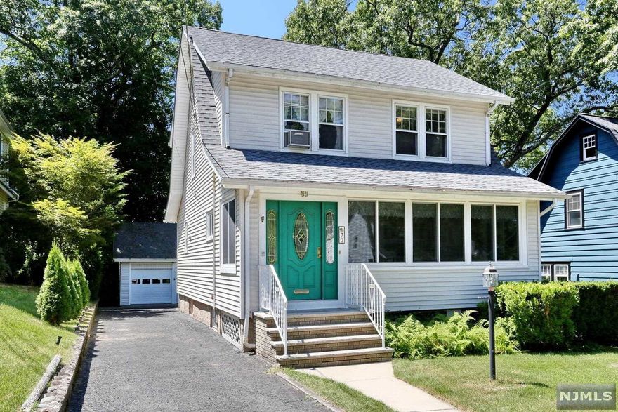 Great opportunity to move into this colonial style home located in the desirable town of Midland Park. This home is located on a picture-perfect street, centrally located to schools, shops and NYC transportation. The first floor features a living room and dining room (hardwood floors under carpet) updated kitchen and powder room. The second floor has three bedrooms with hardwood floors, and a full bathroom. The basement is full unfinished with laundry area, storage and bilco doors. The backyard has a detached 2 car garage and a covered patio, great for entertaining. Roof was replaced 2 years ago. House being sold in "as is" condition.