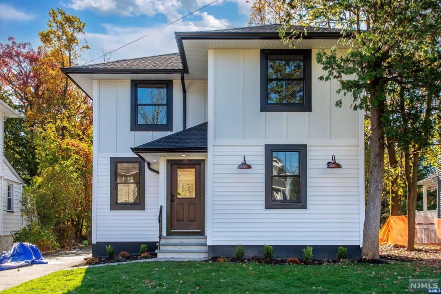 Rarely Available, this Totally Renovated home is ready for it's Close Up, No expense was spared .These quality builders are giving a fresh modern look to this Colonial that will not disappoint. Exciting details throughout ,with, new siding, new roof, new walls ,subfloors, furnace tankless water heater, insulation, solid doors, Anderson windows, moldings, decorative beams, luxury vinyl floors, electric fireplace, impressive kitchen & baths, lighting, electrical, plumbing, heating, A/C, utilities, appliances, finished basement, family room, storage and laundry room The Bertazzoni kitchen appliances with luxury cabinets, black and champaign fixtures, stainless steel ,and more defines luxury. There are two additions one top and bottom for space and comfort. The home office/ mud room has clear door to bring in more natural sun light. The primary BR has en-suite Bathroom and walk-in closet. The location is evident and close to Everything, prominent schools, shopping. NYC trans