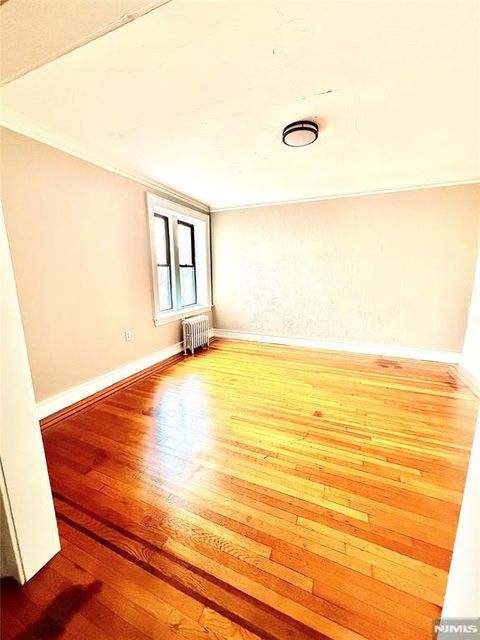 Photo of 17 Elwood Pl #405, Newark, NJ 07104 (MLS # 25042402)