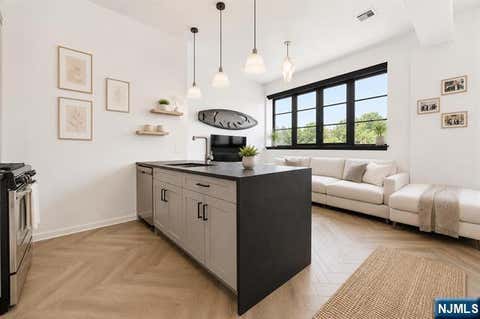 Photo of 142 Charles Street #403, Jersey City, NJ 07307 (MLS # 26026693)