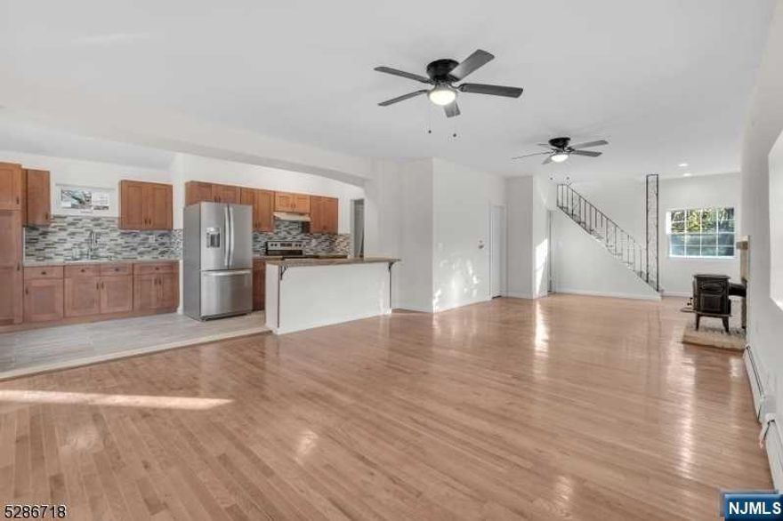 Welcome to 130 Fairlawn Dr sitting on a beautiful dead end block in West Milford. Fully Renovated 3 bed 2 full bath home that boasts tons of natural light through its newly installed windows. First floor has a brand new kitchen with an island, Quartz counter tops. All bedrooms ideally placed on top floor along with a full bath. Outside you have a brand new deck and great side lot for entertaining out doors. Come check out this exceptional home that's been price to sell! Low taxes!