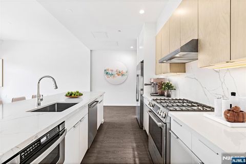 Photo of 143 Old River Rd #501, Edgewater, NJ 07020 (MLS # 25033299)