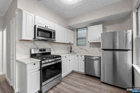 Photo of 292 Claremont AVE #2nd floor, Jersey City, NJ 07305 (MLS # 26030524)