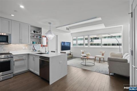 Photo of 800 Ave At Port Imperial #508, Weehawken, NJ 07086 (MLS # 26018120)
