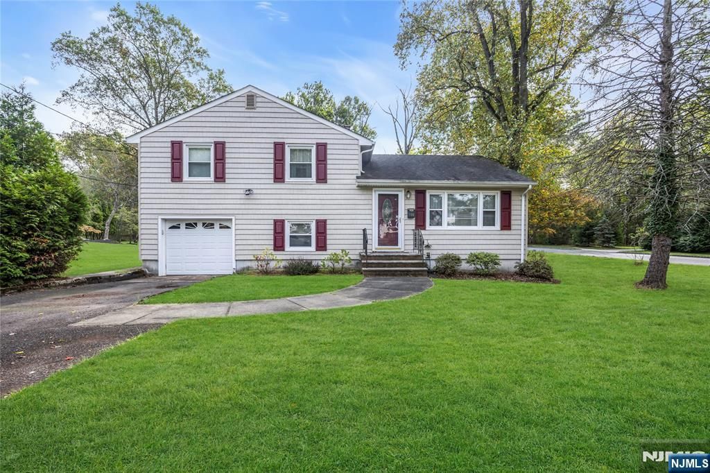 Photo of 100 Sycamore Avenue, Livingston, NJ 07039 (MLS # 25035879)