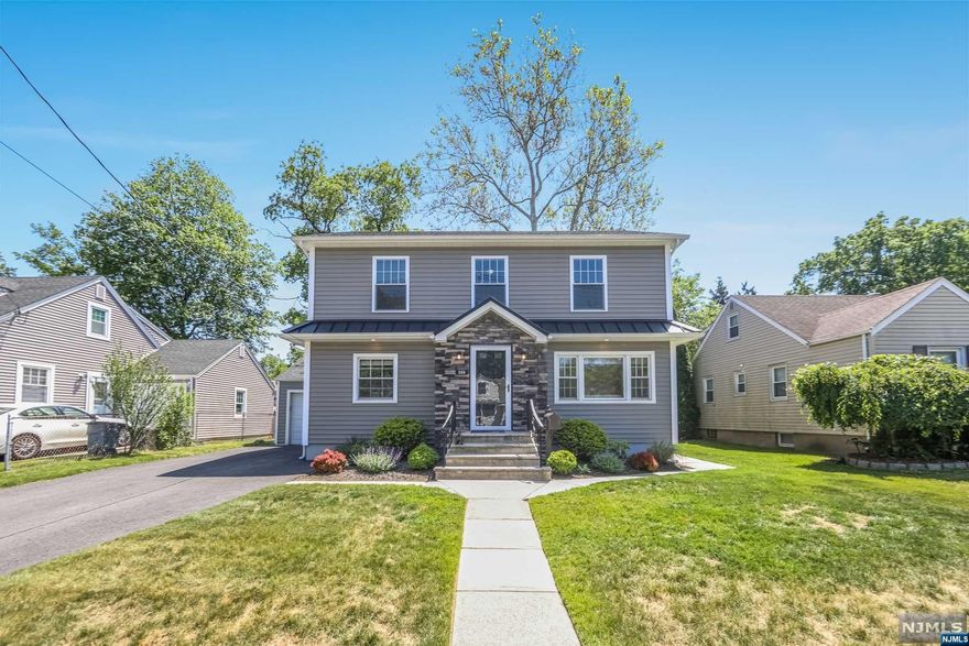 This recently renovated 5 Bed, 4 Bath Colonial will surely impress you...starting with the gorgeous curb appeal. Entry Foyer leads to the living room & an open floor plan - all with hardwood flooring & features a spacious great room, dining room. Eat-in kitchen with tons of storage, quartz countertops & newer stainless steel appliances. Nice sized bedroom or office & a full bath complete the 1st floor. The 2nd floor includes a gracious primary suite with a walk-in closet & bath with double vanity & tremendous shower. Continue with 3 bedrooms, a full bath with double vanity & laundry. The basement is partially finished providing recreation space, tons of storage & a full bath. All newer electric & plumbing throughout. Large deck off of the kitchen is great for entertaining & overlooks the spacious, fenced-in backyard. One car attached garage & 4 car driveway. Located minutes from schools, shopping, parks & houses of worship. A winner for sure!