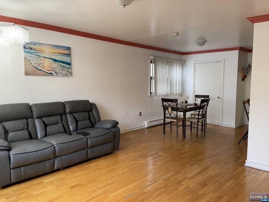 Welcome to this beautiful three-family home in West New York! A commuters dream, with easy access to NYC via the Lincoln tunnel, GW bridge, and public transportation via bus, train, ferry, and light rail. The first floor unit includes one bedroom and one bathroom. The second floor unit includes 3 bedrooms and one bathroom with an open front porch. The third floor unit also includes 3 bedrooms and one bathroom with a open front porch. The second and third floor units boast hardwood floors and large windows offering ample natural light. This home includes a spacious garage as well as two additional off street parking spots - a rare and desirable find in this area. The second and third floor units are both currently rented at market rate rents. The first floor one bedroom unit is not currently rented, but could be easily be rented at market rate rent. Separate utilities make for easy income producing renting. Located in a great location with public transportation less than 1/4 mile.
