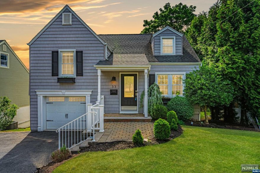 An impeccable, stunning home, just unpack! A gorgeous entryway into the home leads you to the open-concept living room and kitchen. Gleaming dark wood flooring throughout. The newer kitchen with white cabinets, stainless steel appliances, and an eat-in area. 2nd floor has two bedrooms and a fully updated bathroom with modern tiling and a wide sink. 3rd floor primary bedroom adds extra privacy to the room. The bedroom has wonderful natural light and plenty of storage! The lower level is brand-new wall-to-wall carpeting w/ a newer washer and dryer, and a fully updated bathroom with a stall shower. Deck access off the kitchen overlooks the manicured, flat backyard. The space is perfect for all-year outdoor fun! Shed in the backyard, great for all outdoor storage needs. Cedar Grove has a great school district. Steps to NYC transportation, close to shopping, and restaurants. Suburban tranquility. Make this your own!!! DON'T MISS OUT!!!