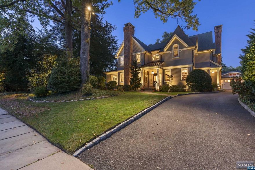 Your dream home awaits in this exquisite 2009 Colonial home in coveted Upper Montclair neighborhood. Exceptional craftsmanship and architecture is showcased throughout. Elegant living room w/ fireplace, spacious dining room, sunny kitchen with center island and pantry, and family room with fireplace. Large office and powder room complete the 1st floor. Luxurious primary bedroom suite with fireplace, renovated bath, and custom walk-in closet. Two additional bedrooms with updated ensuite baths on 2nd floor along with spacious office, sitting area and laundry room. Exceptional third floor with 2 bedrooms, full bath, and living room/office. Large renovated lower level with versatile space: rec room, theatre, fireplace, bath w/ steam shower & sauna, gym, and storage room. Fabulous outdoor space with new bluestone patio, gas fire pit, landscape lighting, 2-car garage and whole house generator. Near NYC direct train, parks, schools, shops & restaurants. Don't miss this one-of-a-kind gem!