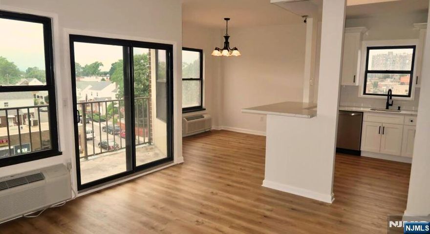 Welcome to this exceptional top-floor 1 bedroom / 1 bathroom condo in a well-maintained elevator building in the heart of Cliffside Park! This bright and spacious residence offers the perfect mix of style, comfort, and convenience. Enjoy a large open-concept layout filled with natural light from skylights, along with a private attached balcony, brand new appliances and finishes throughout, in-unit laundry, a cozy wood-burning fireplace, and generous closet space. The updated kitchen and bathroom add a modern touch, and the oversized bedroom features a walk-in closet for all your storage needs. Rent includes one covered parking space. Located just minutes from shopping, restaurants, and easy access to NYC transit â€” this move-in ready home has it all!