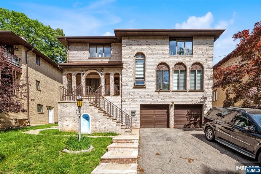 Spacious Duplex for Sale in a Prime Fort Lee Location! Donâ€™t miss this exceptional opportunity to own a massive duplex in Fort Lee. This impressive property features two expansive units, each offering generous living space and layouts designed for comfort and functionality. Unit 1 boasts 3 spacious bedrooms and 2 bathrooms all located on the main level. The open floor plan provides a seamless flow between the living room, dining area, and kitchen. In addition to the main living space, Unit 1 includes a fully finished basement that has been beautifully renovated with an additional full bathroom. Unit 2 mirrors the space of the first unit, with another 3 bedrooms and 2.5 bathrooms. The property includes a large two-car garage, offering plenty of parking and storage. Whether you're looking for a multi-generational living setup, an investment opportunity, or a home with rental income potential, this duplex is an ideal choice. Located in the heart of Fort Lee, this huge home places you just minutes from a vibrant array of restaurants, shopping destinations, parks, and top-rated schools. Commuters will love the easy and direct access to New York City via nearby highways and public transportation. This is a rare find with tremendous value in a thriving community.