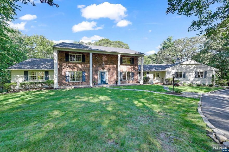 Located on a private cul-de-sac in the exclusive gated community of Smoke Rise, this beautiful 4,000+ sq.ft. 5 BR/4.5 BA Colonial boasts 2 story entry foyer,eat-in kit w/island, formal din rm, warm and inviting fam rm w/fireplace,formal liv rm w/quartz fireplace,sunny office, updated full bath, 1st fl Primary Suite w/gorgeous full ba,delightful screened in porch off fam rm,mudroom,laundry rm, powder rm and entr to 2 car att gar complete the 1st level! 2nd floor has 4 spacious bedrooms and 2 full baths! Ground floor level is fin w/walkout to pool, workout room, huge rec rm, utilities and storage! This gem is situated on 1.93 acres with wooded views, inground gunite pool and circular drive! Newer septic (2021) and new roof! Smoke Rise community has many amenities - Clubhouse, restaurant, beach/lake, tennis, jogging/biking paths, equestrian, boating(non motor). All this luxury and serenity in a private community only 35 miles from NYC! Come fall in love!