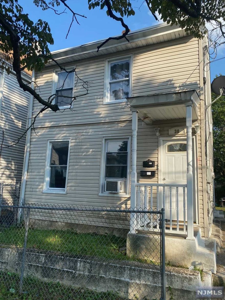One of the best deals in the city! This cute 2 family home was completely gut renovated in 2014 and is located on a quiet street next to park and baseball field on the Haledon border. Each unit is well maintained and offers an updated eat in kitchen and full bathroom, living room and 2 bedrooms. Each unit is currently on month to month leases with first floor paying 1000 and 2nd floor paying 1100. Both units have separate gas and electric utilities with tankless hot water and gas furnace systems. The backyard is flat and can be turned into a great outdoor space. Its also usually very easy to find street parking on this street. Come take a look you will be impressed!