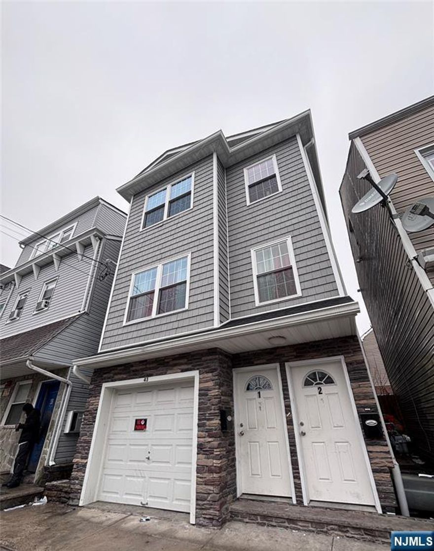 Welcome to this modern two-family house, built in 2023 and thoughtfully designed for comfortable living and investment potential. The first floor features 2 bedrooms, kitchen, LR/DR combo, storage and 1 full bathroom. The second unit offers a unique two-level layout, showcasing modern living at its finest. It includes 3 bedrooms, a spacious eat-in kitchen, living room, dining room and 2 full bathrooms. The property also includes an attached one-car garage.
