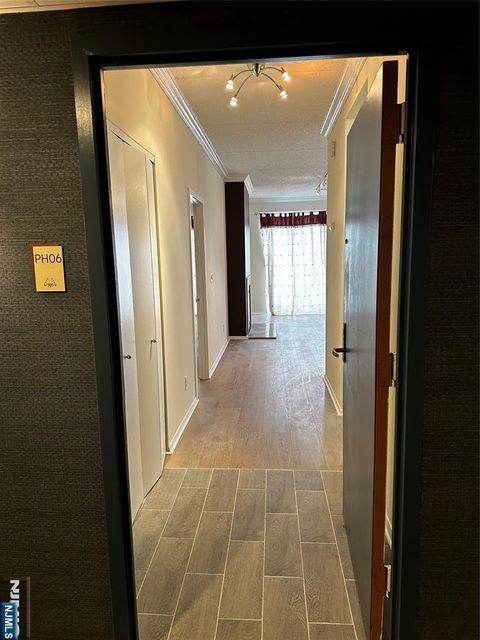 Photo of 1077 River Rd #PH6, Edgewater, NJ 07020 (MLS # 26006206)