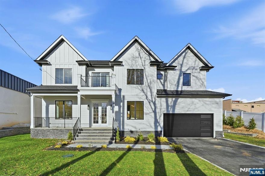 Stunning brand new construction offering 6 bedrooms and 5.5 bathrooms. Step through the grand two story foyer into elegant formal living and dining rooms.The gourmet kitchen is a chef's dream, featuring premium stainless steel appliances, a walk-in pantry, a dedicated bar area, large center island and an open concept layout that flows into the double height family room with fireplace. Sliding glass doors provide easy access to the backyard, while an overlook from the second floor hallway adds architectural interest.The first level also includes a private first floor bedroom with en suite bath and walk in closet as well as a mudroom, powder room, and direct access to a two car garage.Upstairs, the luxurious primary suite boasts his and hers closets, a soaking tub and stall shower, and a private balcony overlooking the backyard. Three additional bedrooms include a junior suite with its own bath, as well as two bedrooms that share a well appointed hall bath. A front facing balcony and a central laundry room complete the upper level.The fully finished basement is designed for both relaxation and functionality, offering a spacious recreation area, media room for movie nights, a sixth bedroom with full bath, ideal for guests, an enclosed home office.