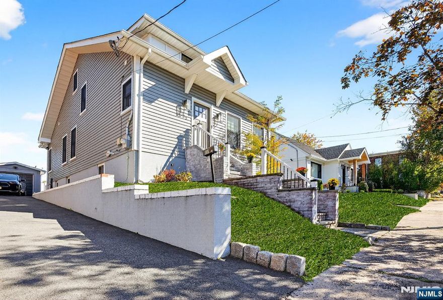 Welcome to 32 Wingra Ave, a beautifully renovated single-family home located just two blocks from Memorial Park. This open and airy 3-bedroom, 3.5-bathroom residence boasts 2,188 square feet of thoughtfully designed living space. Step inside to discover the expansive, open-concept layout with living room, dining area, family room and chef's kitchen. Whether you're hosting a dinner party or enjoying a quiet meal, this kitchen is impressive and functional with sliders out to the back porch and private fenced-in backyard. A powder room and additional bonus room (office or walk-in pantry) complete the first floor. The bedrooms, main full bathroom (with double vanities) and laundry room can be found on the 2nd floor. The primary suite is a true retreat with a luxurious ensuite bathroom and a spacious walk-in closet. The property also features a finished basement with full bathroom, perfect for guests or recreation room. Private driveway and detached garage for plenty of parking and entry from back of home. Don't miss the opportunity to call 32 Wingra Ave home, where comfort, style, and convenience meet in this fully renovated gem. Just 3 blocks from the NYC bus and close to the train station and vibrant downtown, Rutherford offers unparalleled desirability.