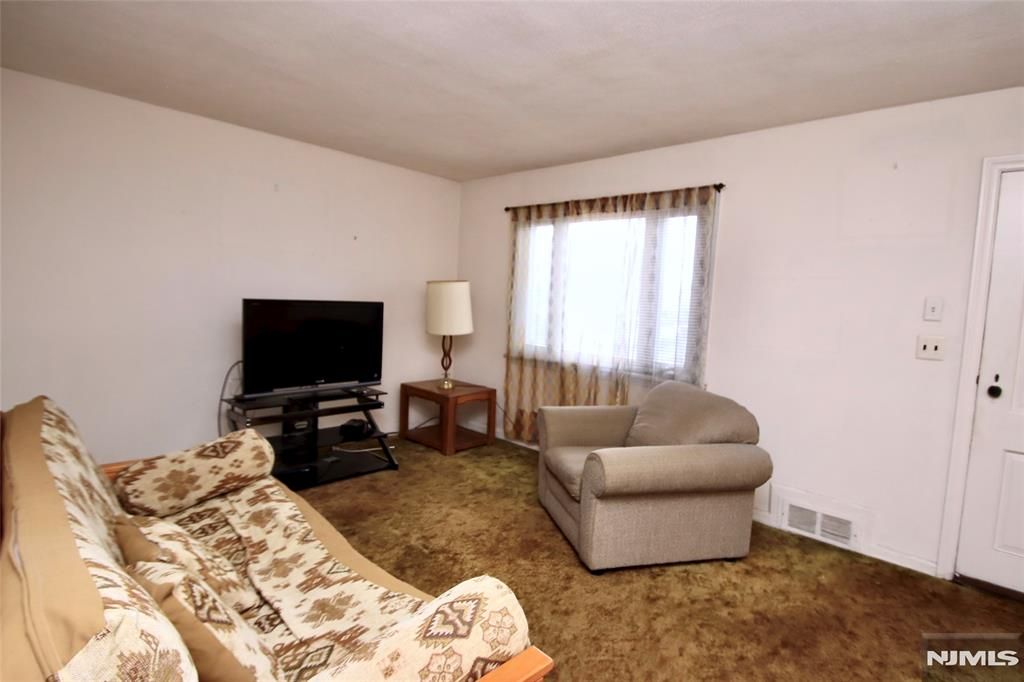 Photo of 3923 Van Duren Ave, Fair Lawn, NJ 07410 (MLS # 26008846)