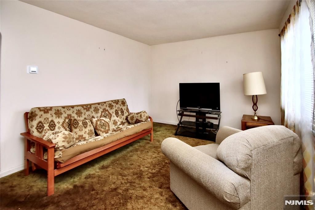 Photo of 3923 Van Duren Ave, Fair Lawn, NJ 07410 (MLS # 26008846)