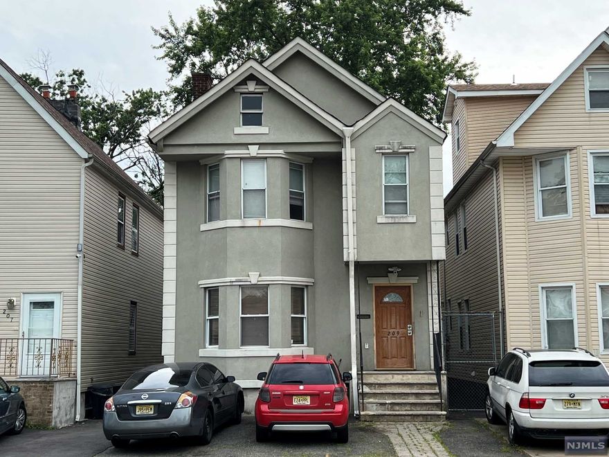 Find your perfect home on Park! Wonderful stucco fa ade two family in superb neighborhood offering you the best of East Orange while also being steps from Glen Ridge and West Orange. Beyond its ideal location, the home offers the desirability of being an income-producing property great for Owners or Investors alike while also being in turnkey condition. Unit 1 offers you an open floor plan with huge great room that contains the updated eat in kitchen, expansive lovely living room, and separate dining room with door to the backyard. Amazing Master Bedroom in the front with bay window, two additional comfortable bedrooms, and full bath. Unit 2 offers you a slightly different layout that also features a spectacular great room with a custom kitchen and bright living room. Wonderful Master Bedroom and 3 additional spacious bedrooms along with a full bath. Both units have Central Air perfect for the Summer as well as wonderful hardwood floors. Huge gated backyard. Amazing deal!