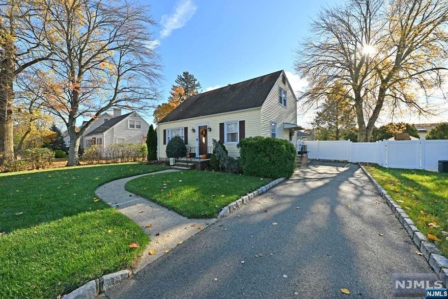 Welcome to this charming rear dormer cape cod on a dead-end street. The warmth of this home draws you in! As you enter, you will notice the nice open flow of space, hardwood floors and beautifully adorned moldings. The living room opens to the dining area and updated kitchen. Cherry cabinets, granite counters and breakfast bar. The side door leads to the expansive driveway with Belgium block edging and fenced in backyard. The first floor has one good size bedroom and a renovated bathroom, with nice neutral tones. Upstairs boasts a primary bedroom, ample closet space and another good size bedroom. There is also another full bath. The basement has tons of finished space. Great TV room area and another finished room, to use the space for what suits your needs. Laundry area, central air, newer hot water heater and LOW TAXES!!!!Close to shopping and major highways.