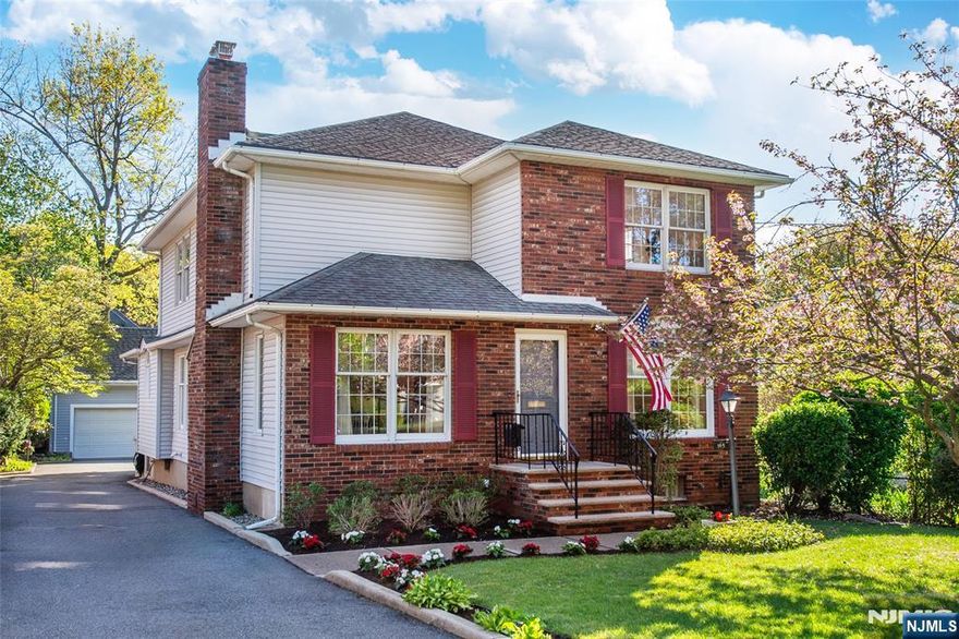 Welcome to this spacious (2500+sqft) & inviting center hall Colonial in the heart of Rutherford, NJ. A welcoming entry foyer sets the tone for this beautifully maintained home, featuring a formal LR with a cozy gas FP & an elegant formal DRâ€”perfect for entertaining. The modern eat-in kitchen is designed to impress, showcasing sleek quartz countertops, classic subway tile backsplash, & SS appliances. The 1st FL also offers a generously sized BR with a walk-in closet, a newer full bath, & a versatile denâ€”ideal as a home office, guest room, or potential additional BR. Upstairs, youâ€™ll find 3 generously sized BR's, all with ample closet space, along with a 4th room being used for storage that can easily be converted into an additional BR or flex space to suit your needs. Throughout the home, brand new HW floors add warmth & continuity. Comfort is key with Central AC on the 1st Fl & wall units on the 2nd Fl. The large, partially fin.basement spans the full footprint of the home, offering endless possibilities for recreation, storage, or add'l living space. Outside, a long driveway leads to a 2-car det. garage complete with an impressive loftâ€”perfect for a home office, game room, studio, or creative retreat. Perfectly situated, this home provides easy access to NYC transportation & is just moments from Rutherfordâ€™s vibrant downtown, known for its charming shops & acclaimed restaurants. A wonderful opportunity to enjoy space, style & convenience all in 1 location.