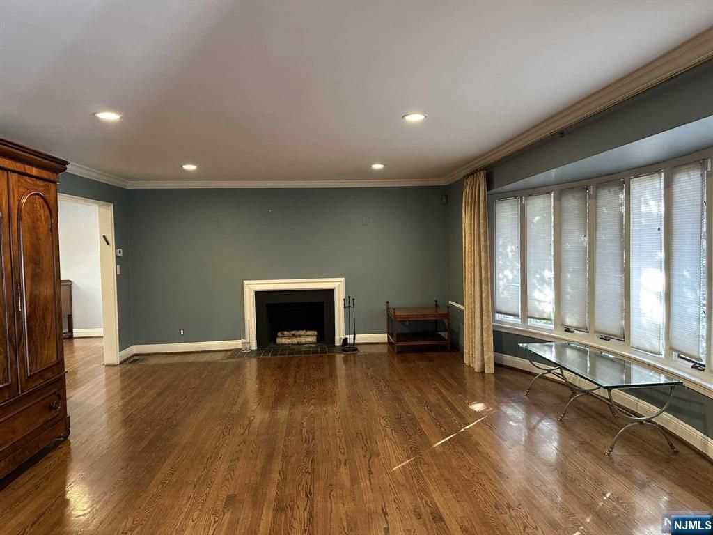 Photo of 711 Camperdown Road, Teaneck, NJ 07666 (MLS # 24038114)