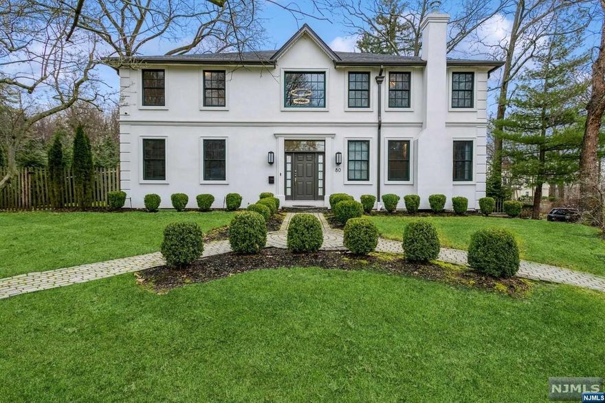 Experience the charm of this beautifully renovated home, ideally located in the tranquil east part of town. This property offers unparalleled convenience, being just a short walk from bus stops, schools, and the lively downtown area. Featuring a comprehensive gut renovation, it boasts new flooring, remodeled bathrooms, a modern kitchen with high-end appliances, updated plumbing, electrical systems, new roof and gutters, and refreshed exterior stucco. The high ceilings and open floor plan on the first floor enhance the spacious feel. The first floor includes a double entry foyer, a formal living room with wood burning fireplace, a large kitchen, expansive dining room wood burning fireplace, and an office or bedroom with a powder room. Upstairs, there are three bedrooms, two full baths, and a luxurious primary suite with a walk-in closet and bathroom with a steam shower. The finished basement adds a full bathroom, recreation area, and ample storage space with 2 car garage access.