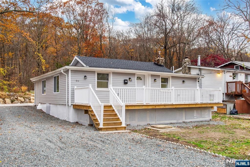 Photo of 25 Setting Sun Trail, West Milford, NJ 07480 (MLS # 25039668)