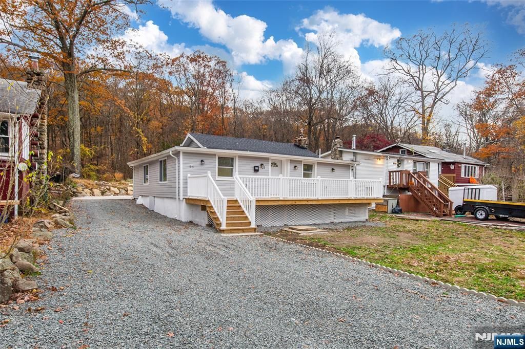 Photo of 25 Setting Sun Trail, West Milford, NJ 07480 (MLS # 25039668)